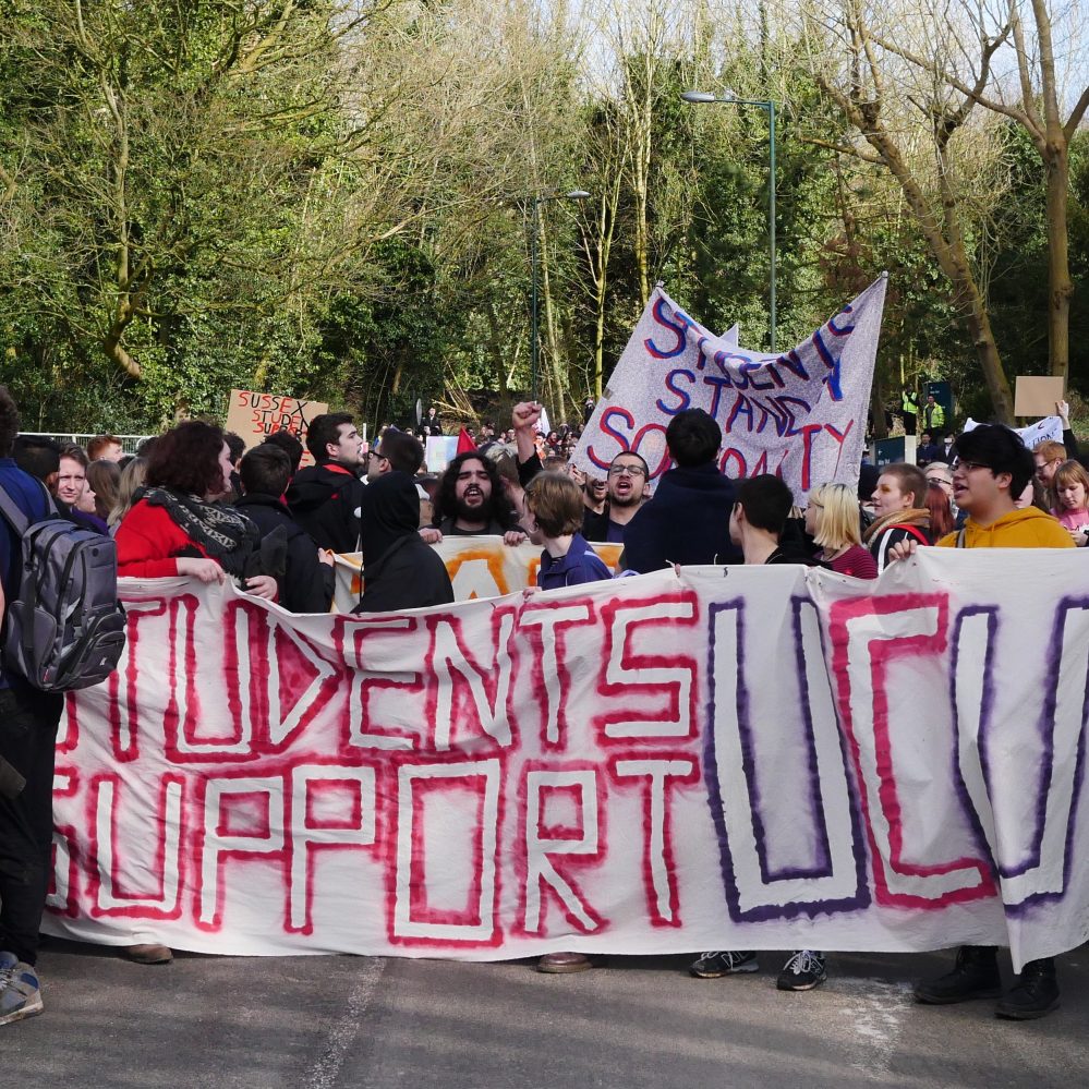 Students march in solidarity with staff, and against fees