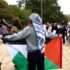 Palestine protest man holding flag